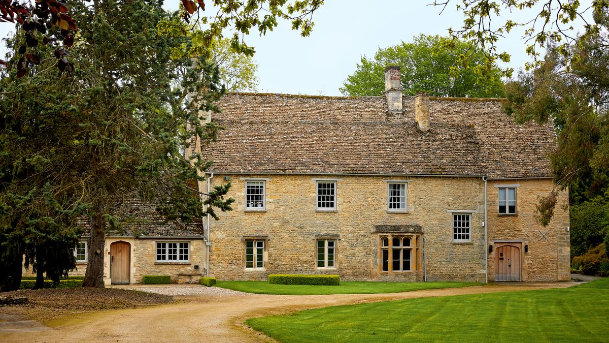 This Cotswolds manor house has a chalet-inspired interior with a twist |