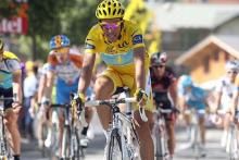 Alberto Contador (Astana) in yellow on his way to a Tour de France win.