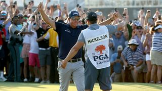 Phil Mickelson celebrates his PGA Championship with caddie Tim