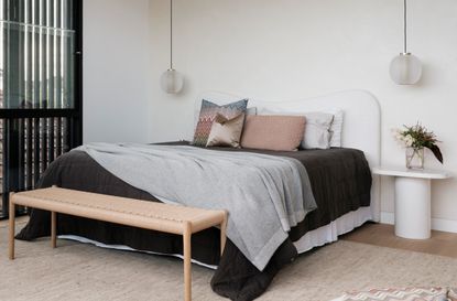 A storage bed in a minimalist bedroom