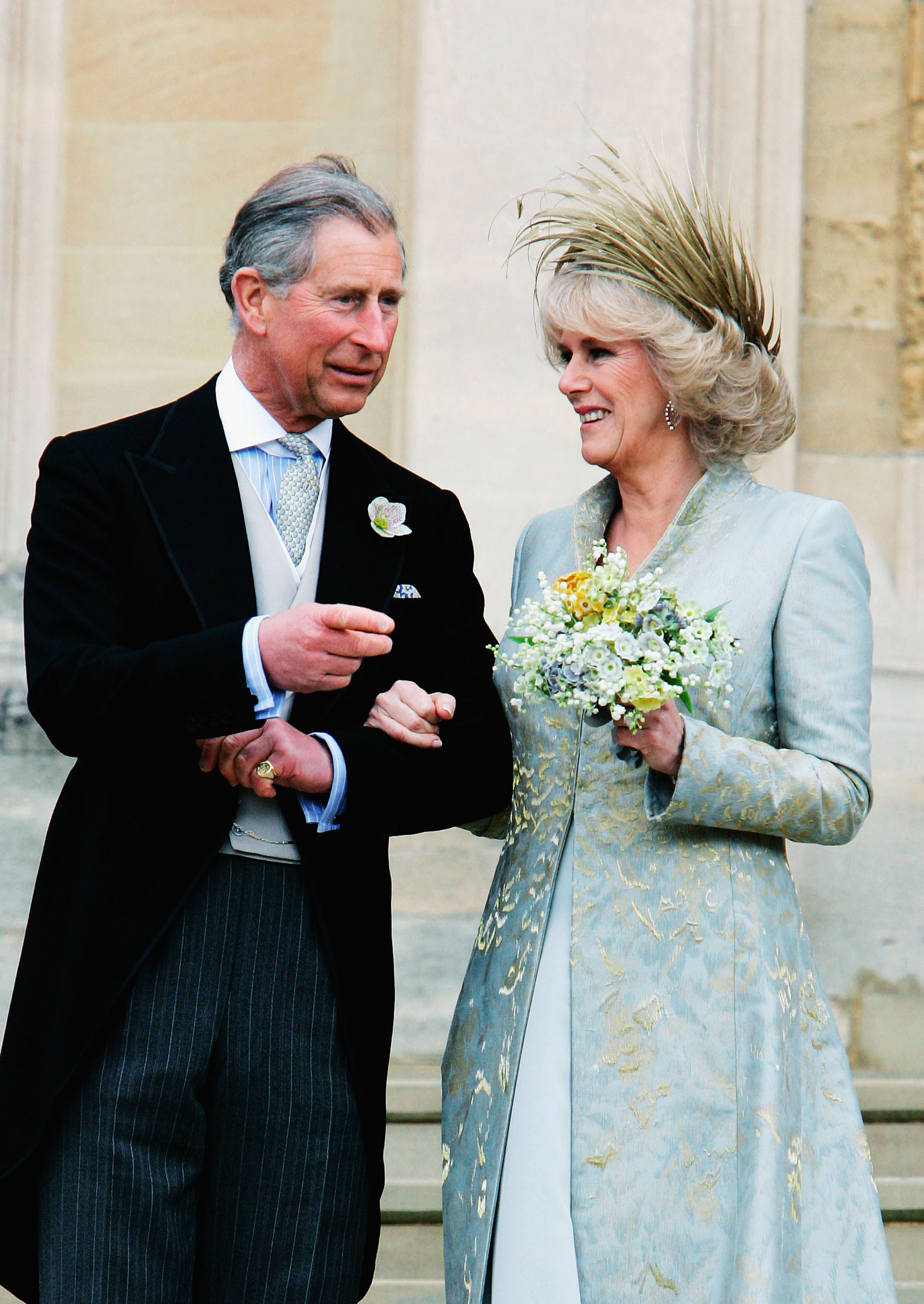 WINDSOR, ENGLAND - APRIL 9: TRH the Prince of Wales, Prince Charles, and The Duchess Of Cornwall, Camilla Parker-Bowles in silk dress by Robinson Valentine and head-dress by Philip Treacy, at the Service of Prayer and Dedication blessing their marriage at Windsor Castle on April 9, 2005 in Berkshire, England. (Photo by Tim Graham/Getty Images)
*** Local Caption *** Prince Charles, Prince of Wales;Camilla Duchess of Cornwall