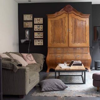 living room with photoframe on grey wall