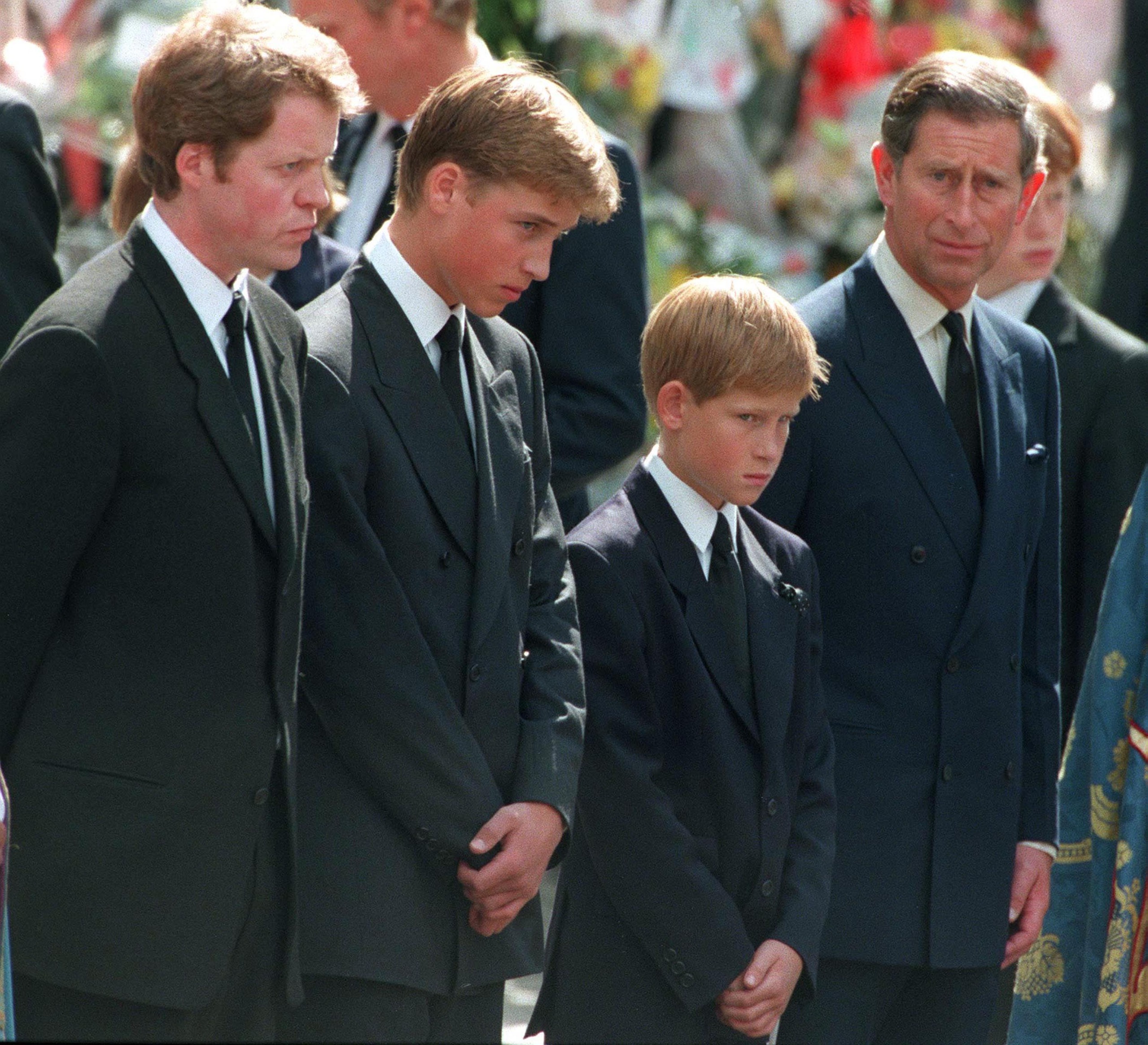 Charles Spencer, Prince William, Prince Harry and Prince Charles standing in a row at Princess Diana's funeral
