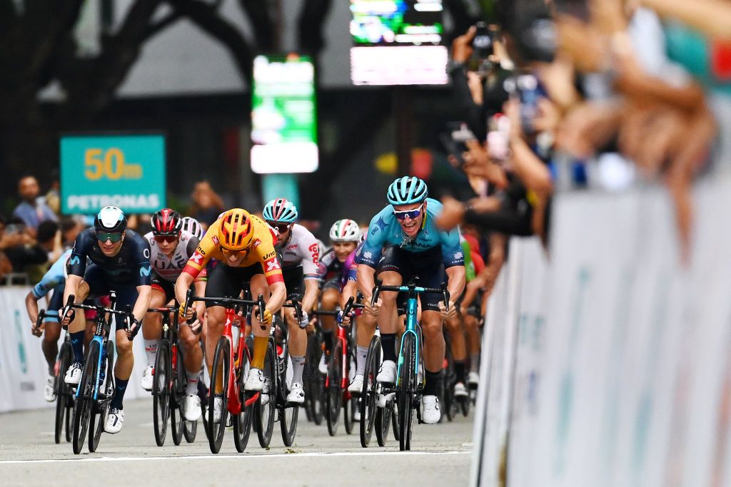 KUALA LUMPUR MALAYSIA OCTOBER 11 LR Max Kanter of Germany and Movistar Team Erlend Blikra of Norway and UnoX Pro Cycling Team and Gleb Syritsa of Russia and Astana Qazaqstan Team sprint at finish line during the 26th Le Tour de Langkawi 2022 Stage 1 a 1573km stage from Kuala Pilah to Kuala Lumpur PETRONASLTdL2020 on October 11 2022 in Kuala Lumpur Malaysia Photo by Tim de WaeleGetty Images