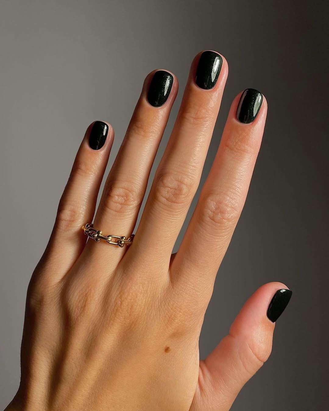 A shimmering green manicure by Mateja Novakovic