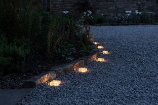 lighting alongside path in gravel by Lights4fun