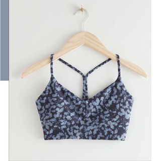 & Other Stories Quick-Dry Halter Yoga Bra hanging up, one of the best bralettes