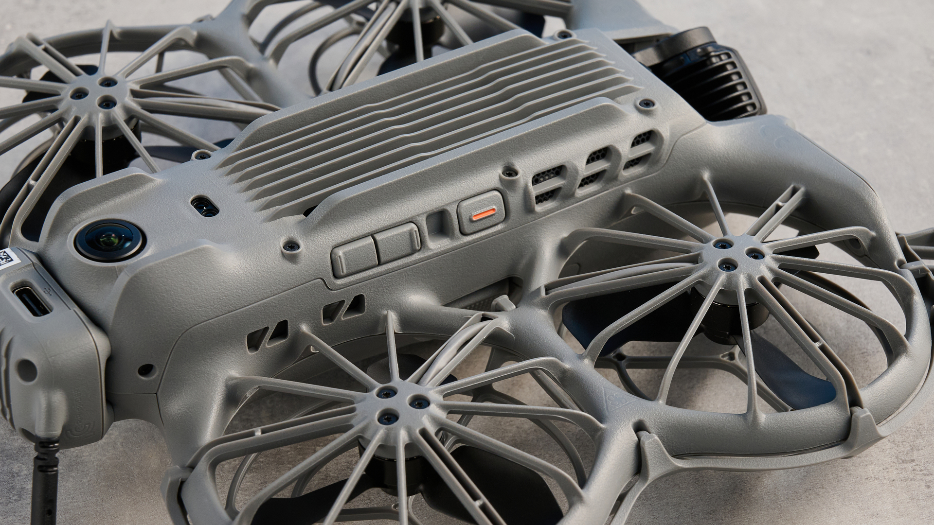 A dark gray DJI Neo 2 camera drone