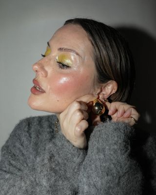 Katie Jane Hughes wearing a dewy makeup look