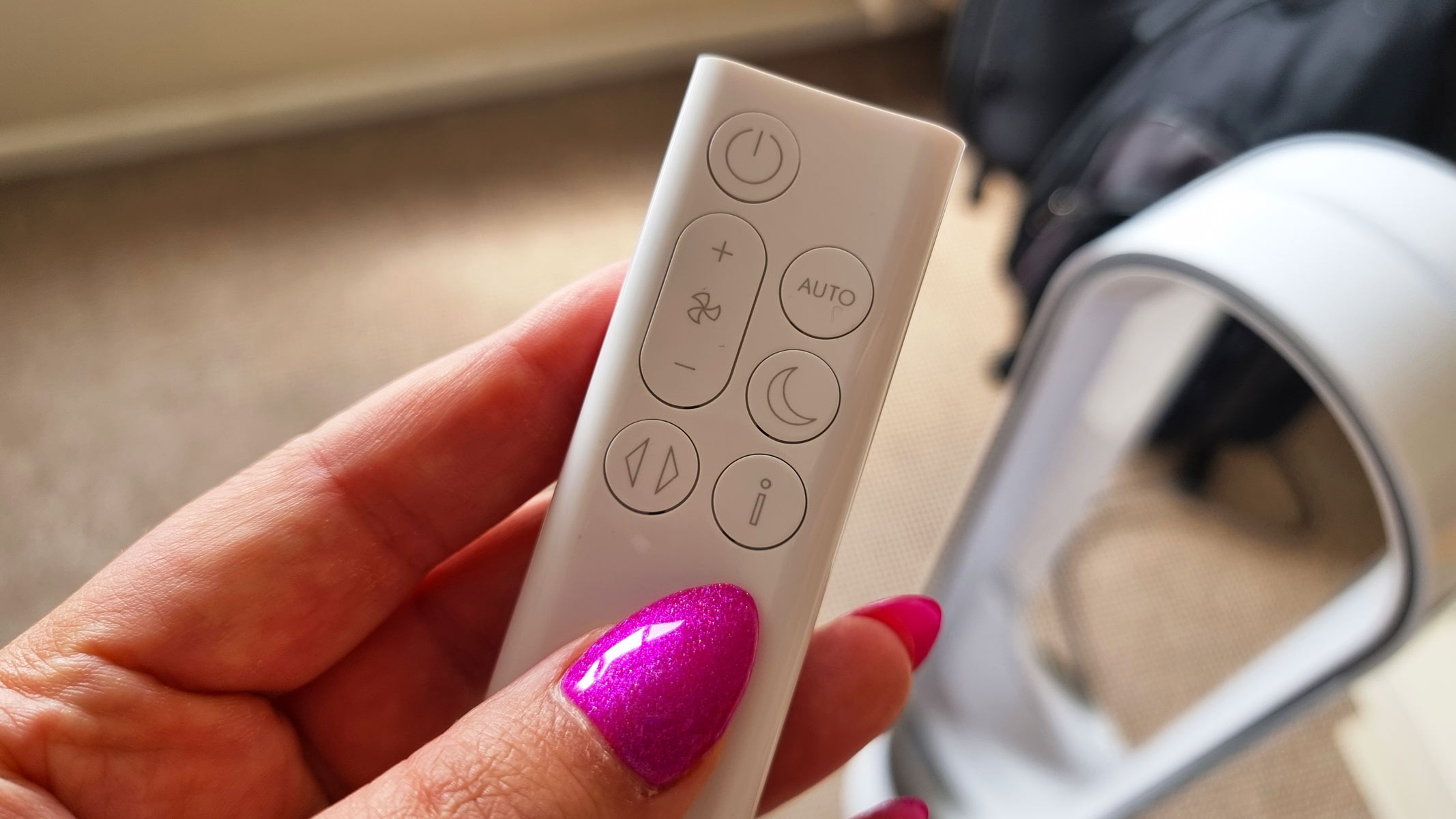 A close-up picture of the remote control for the Dyson Purifier Cool PC1