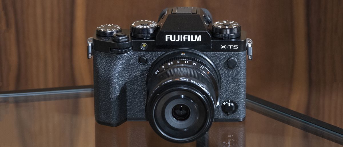 The Fujifilm X-T5 camera sitting on a table