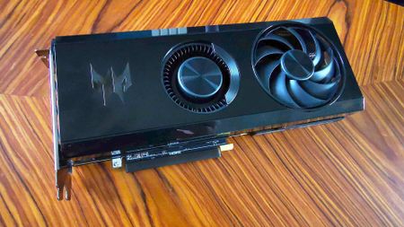 Acer Radeon RX 7600 graphics card on woodgrain table