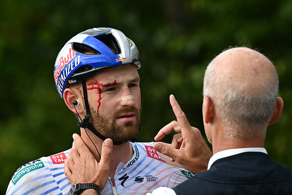 Red Bull - BORA - hansgrohe team's Belgian rider Jordi Meeus receives medical attention after suffering a crash in the final kilometres of the the 3rd stage of the 112th edition of the Tour de France cycling race, 178.3 km between Valenciennes and Dunkerque (Dunkirk), Northern France, on July 7, 2025. (Photo by Loic VENANCE / AFP) (Photo by LOIC VENANCE/AFP via Getty Images)