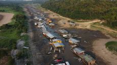 "Traffic jams&rdquo; of boats and floating houses on the dry bed of Lake Puraquequara, in the outskirts of Manaus.