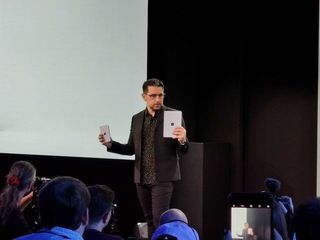 Panos Panay on stage with Surface Neo and Surface Duo