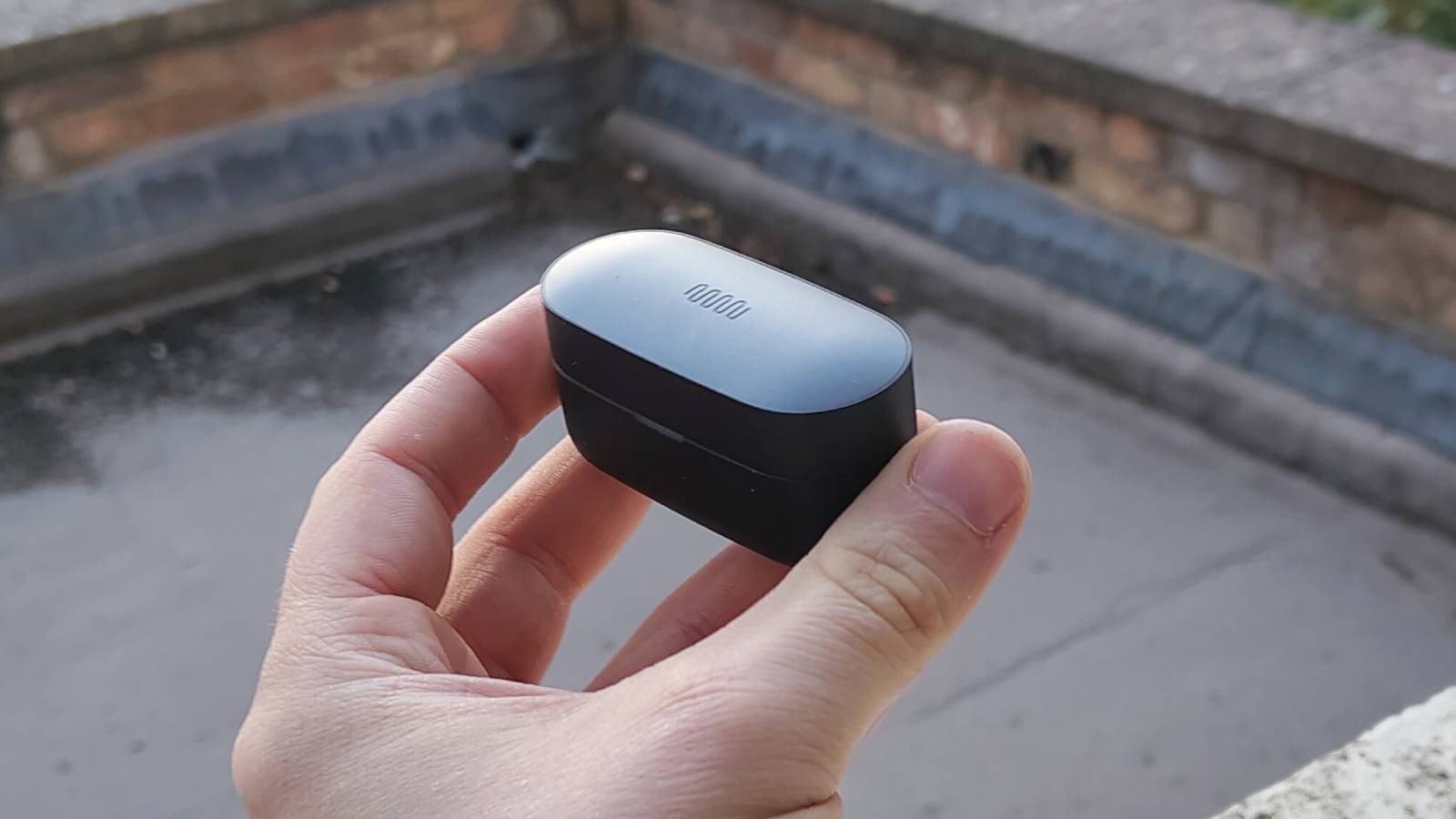 The Status Audio Pro X on a window sill.