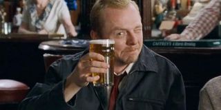 Shaun raises a pint at the winchester Shaun of the Dead