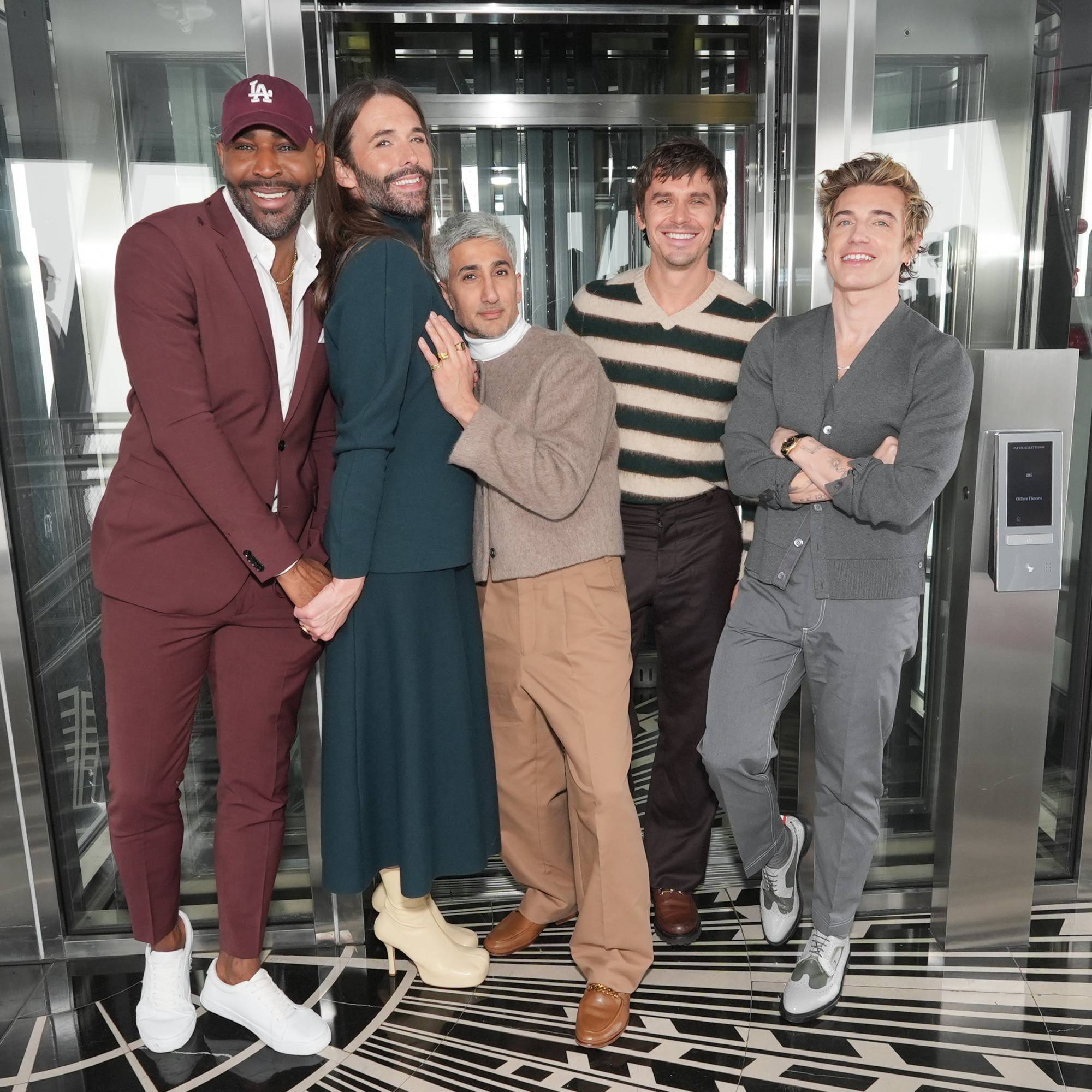 The stars of Queer Eye standing together