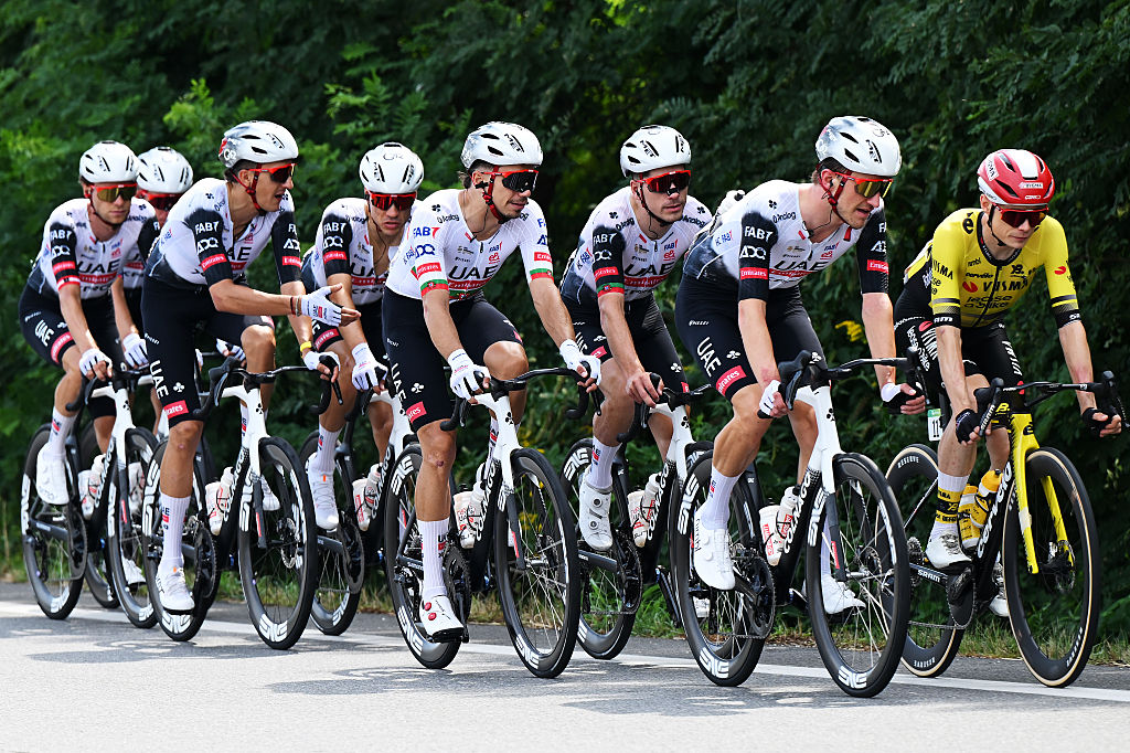 NOVARA, ITALY - AUGUST 23: (L-R) Ivo Oliveira of Portugal, Joao Almeida of Portugal, Mikkel Bjerg of Denmark and UAE Team Emirates - XRG nd Jonas Vingegaard of Denmark and Team Visma | Lease a Bike compete during the La Vuelta - 80th Tour of Spain 2025, Stage 1 a 186.7km stage from Torino-Reggia di Venaria to Novara / #UCIWT / on August 23, 2025 in Novara, Italy. (Photo by Dario Belingheri/Getty Images)