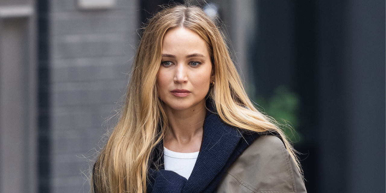 Jennifer Lawrence is seen in SoHo on June 28, 2023 in New York City wearing a trench coat