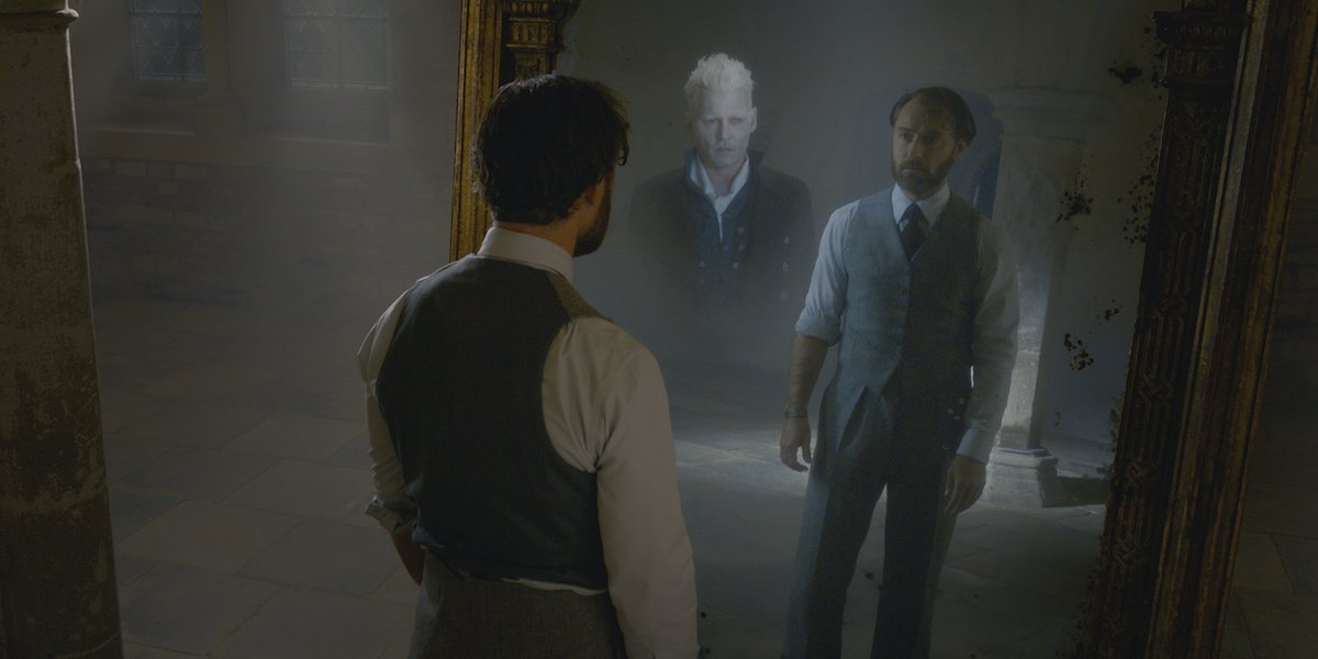 Johnny Depp and Jude Law as Grindelwald and Dumbledore in Fantastic Beasts