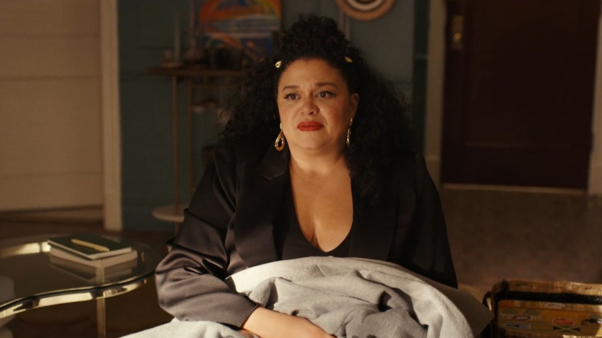 Michelle Buteau looking sad in Survival of the Thickest.