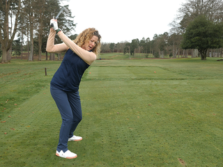 Golf Monthly Top 50 Coach Katie Dawkins demonstrating swing plane at the top of the backswing