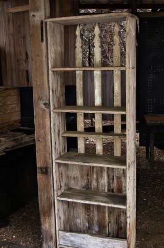 Old worn homemade wooden bookshelf