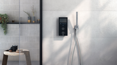 a digital shower system in a modern, light tiled bathroom 