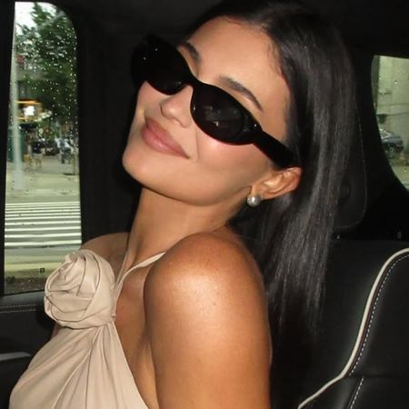 Kylie Jenner wore a vintage Gucci by Tom Ford summer dress to celebrate the launch of her Meta sunglasses