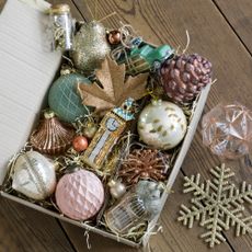 assortment box of decorative christmas baubles