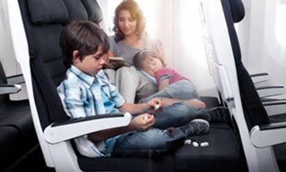 In "cuddle class" three economy-size seats can transform into sofas or beds for long international flights on New Zealand Air.
