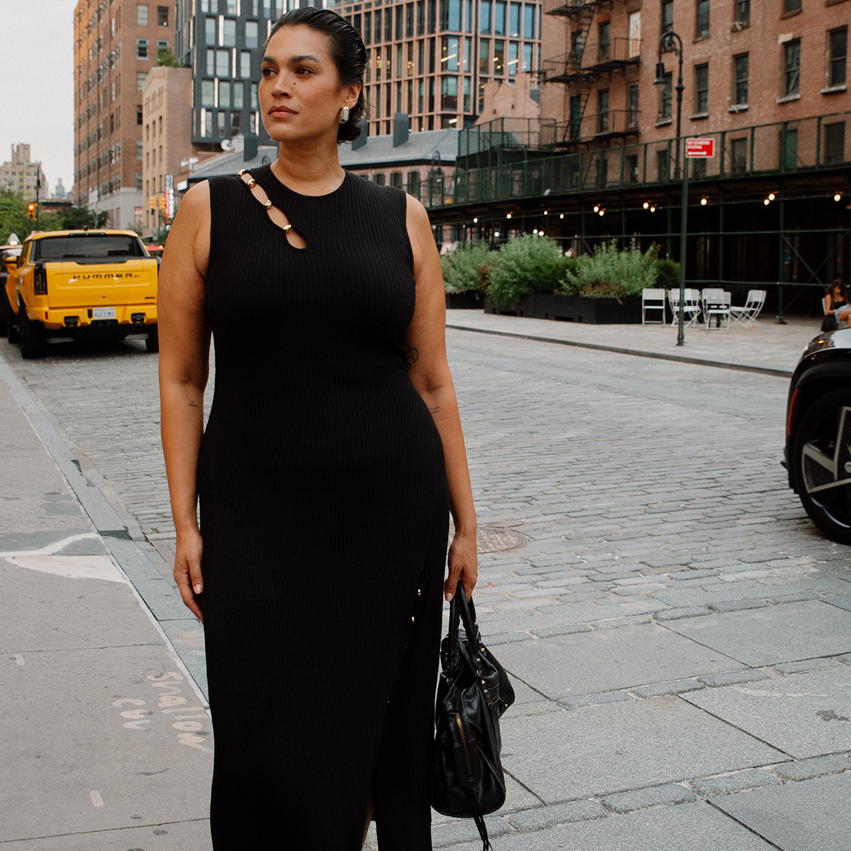jennifer atilemile wearing a knit maxi dress