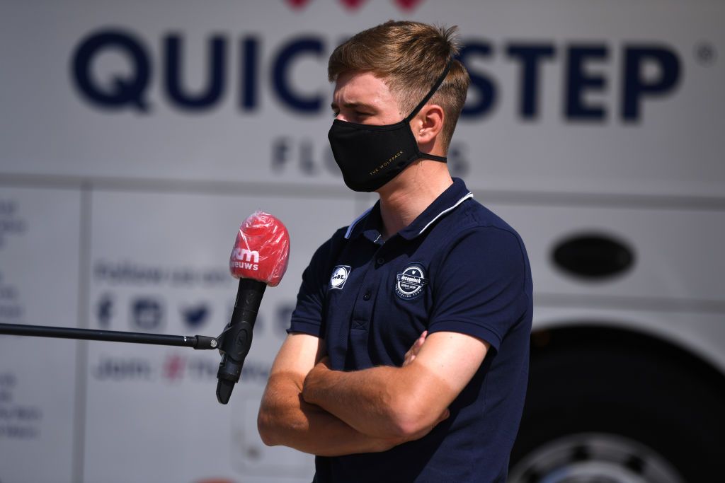 ESPINOSA DE LOS MONTEROS SPAIN JULY 30 Start Remco Evenepoel of Belgium and Team Deceuninck QuickStep Covid Safe measures The Wolfpack Mask Interview Press Media Sargentes de la Lora Village during the 42nd Vuelta a Burgos 2020 Stage 3 a 150km stage from Sargentes de la Lora to Espinosa de los Monteros Picn Blanco 1486m VueltaBurgos on July 30 2020 in Espinosa de Los Monteros Spain Photo by David RamosGetty Images