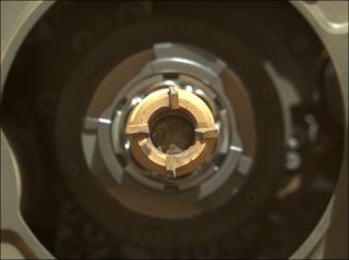 This image, captured by NASA's Perseverance Mars rover on Sept. 1, 2021, shows a cored sample in one of the robot's sampling tubes. Mission team members think the sample was retained but will take a few more photos to make sure.