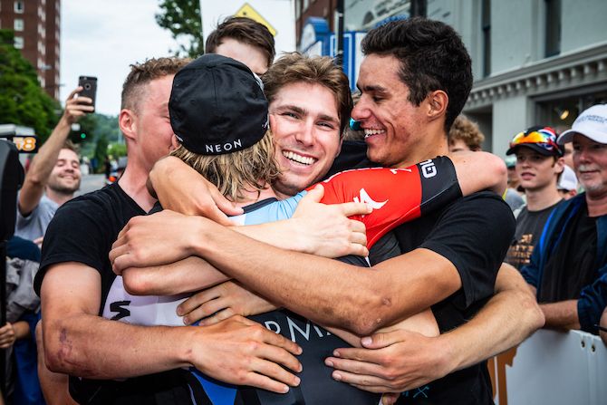 Jonny Brown (Axeon) gets hugs from teammates after winning the US Pro Road Race National Championships on June 24, 2018 in Knoxville, Tennessee