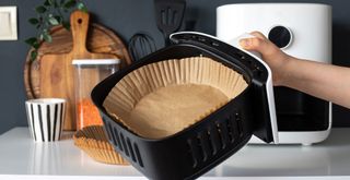 air fryer basket lined with parchment paper