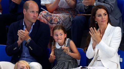 Prince William, Duke of Cambridge, Princess Charlotte of Cambridge and Catherine, Duchess of Cambridge watch the swimming competition at the Sandwell Aquatics Centre during the 2022 Commonwealth Games on August 2, 2022 in Birmingham, England.