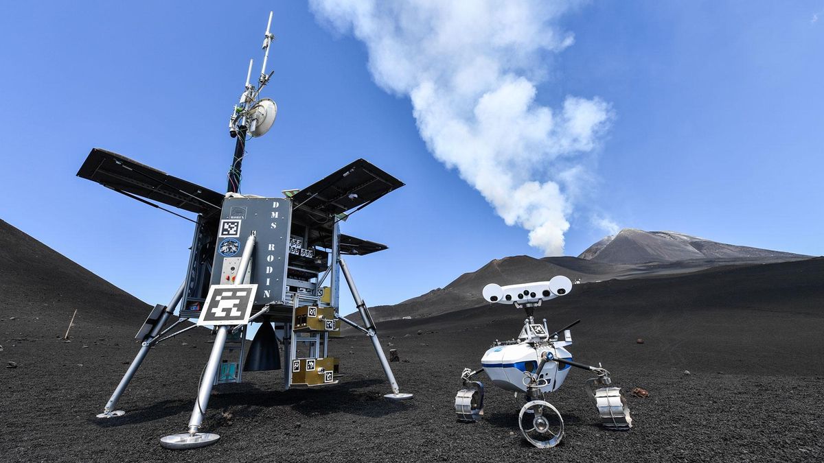 The Lightweight Rover Unit 1 practices with a simulated lunar lander on the moon-like slopes of Italy's Mount Etna.