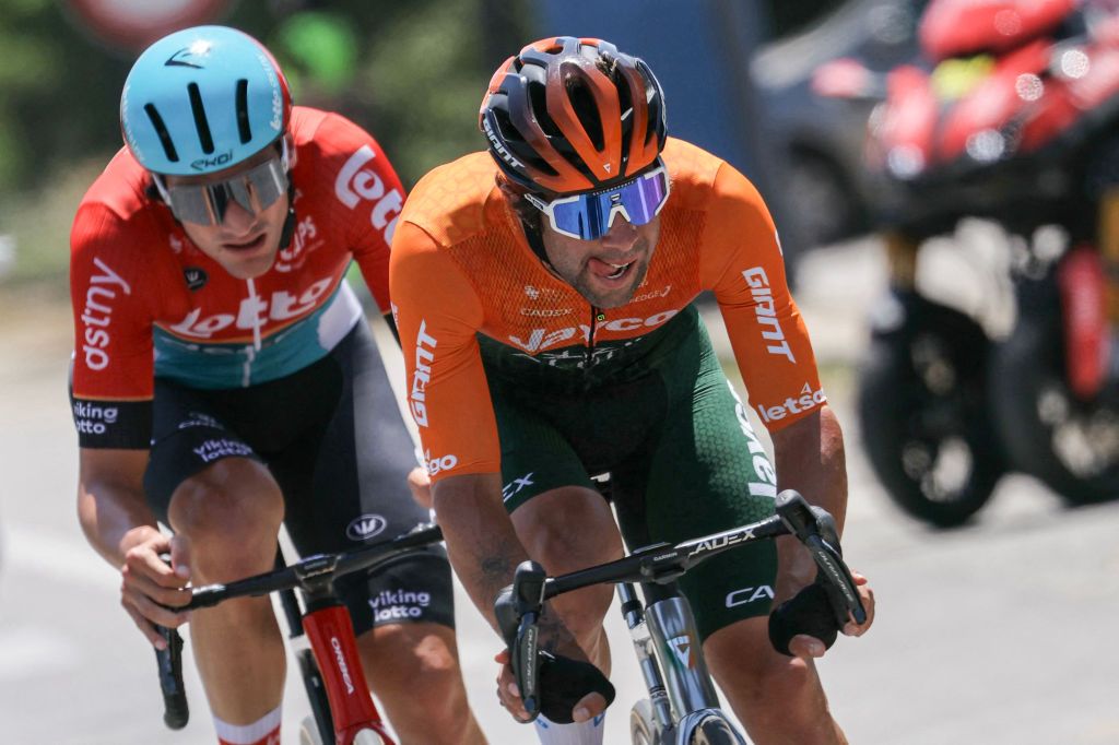 Lotto Dstny team's Belgian rider Brent Van Moer (L) and Team Jayco AlUla team's Australian rider Michael Matthews (R) cycle in an intermediate breakaway during the 2nd stage of the 111th edition of the Tour de France cycling race, 199 km between Cesenatico and Bologna, in Italy, on June 30, 2024. (Photo by Thomas SAMSON / AFP)