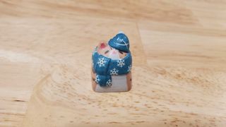 a small cat shaped keycap