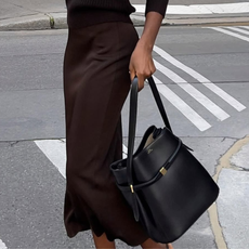Sylvie carrying a Toteme bag