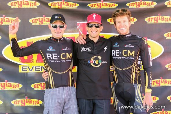 First three men overall, from left: Lourens Luus (second), Christoph Sauser (first) and Erik Kleinhans (third).