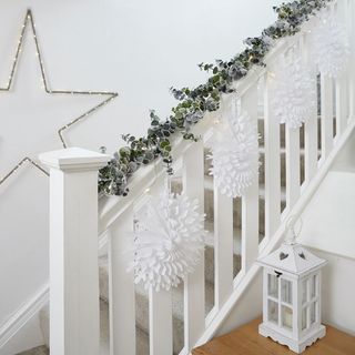 room with staircase white wall