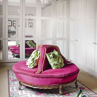 dressing room with pink seating