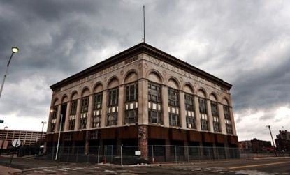 A vacant building sits on an empty street corner in Detroit's Greektown: One-fourth of the Motor City's residents left town in the last 10 years. 