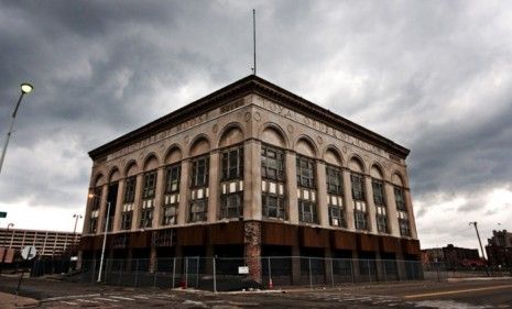 A vacant building sits on an empty street corner in Detroit&amp;#039;s Greektown: One-fourth of the Motor City&amp;#039;s residents left town in the last 10 years. 