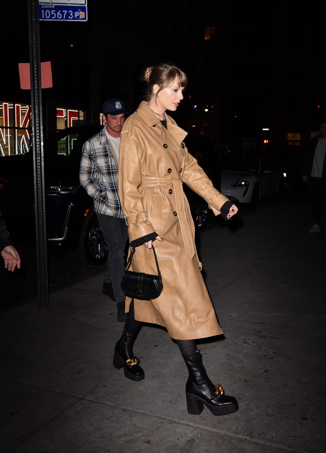 Taylor Swift wearing trench coat