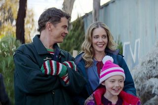 a family at a christmas tree farm in 'I Believe in Santa'