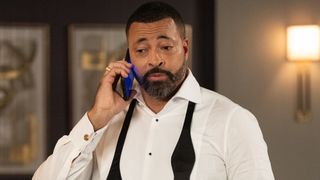 Timon Durrett as Bill Hamilton on the phone in Beyond the Gates